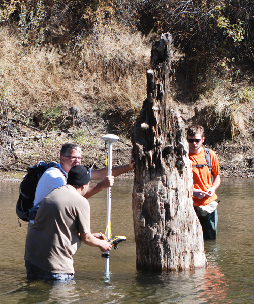 Courtesy of Douglas P. Boyle Nevada State Climatologist Douglas P. Boyle and undergraduates in his Mountain Geography class at the University of Nevada visited the upper West Walker River in fall 2013. The tree stumps they are examining provide evidence that the Medieval Climatic Anomaly struck the Great Basin with warmer temperatures and drought hundreds of years ago. 