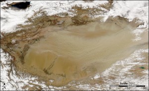 NASA Earth Observatory Boyle and Sean Birkel of the University of Maine are working to model climate change in China's desert-filled Tarim Basin, seen here via satellite. This dust bowl stretches across nearly 260,000 square kilometers, hemmed in by mountains and the Tibet Plateau.