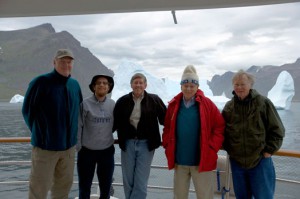 Photo by Philip Walsh, courtesy of the Comer Science and Education Foundation  Key climate change scientists joined Gary Comer (red jacket) on his yacht the Turmoil for a research trip to Greenland in 2005. From left, George Denton of the University of Maine, Richard Alley of Pennylvania State University, Philip Conkling of the Island Institute, Comer and Wallace Broecker of Columbia University's Lamont-Doherty Earth Observatory.   