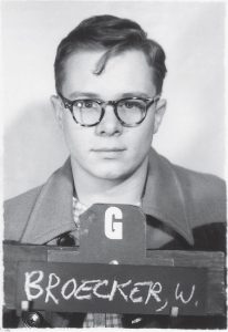 Young Wally Broecker posing with his name in mugshot style.